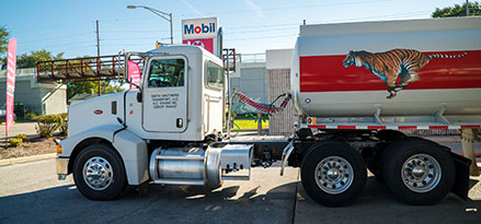 Branded wholesaler heavy duty truck at Mobil station