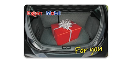 Exxon and Mobil gas gift card with design of present box in the car trunk