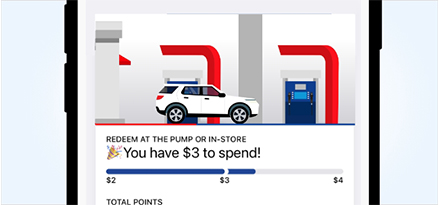 Middle of phone with Exxon Mobil Rewards+ gas app displayed with gas savings and gas rewards points visible