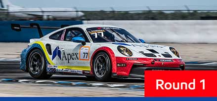 White Porsche Carrera racing at the Sebring International Raceway