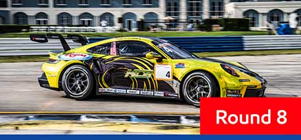 Yellow and black Porsche Carrera racing at Circuit of The Americas