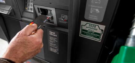 fleet card inserted into a diesel fuel pump