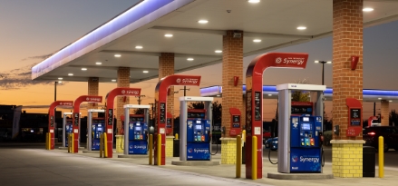 Exxon or Mobil gas station pumps at night